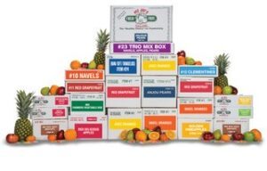 Colorful boxes of assorted fruit snacks and treats stacked together.